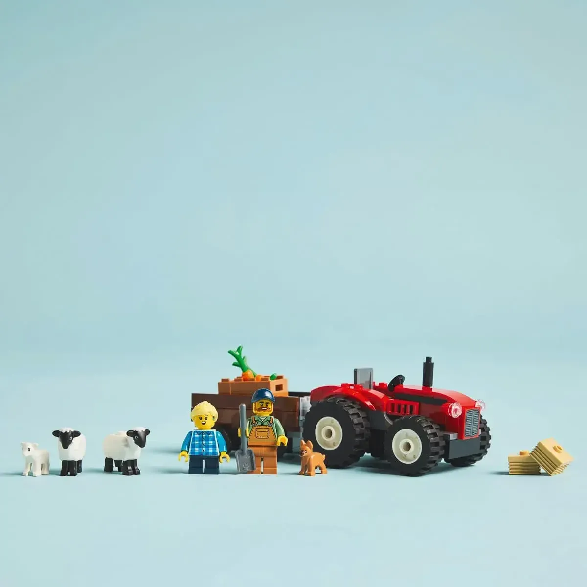 Конструктор LEGO City Червоний фермерський трактор із причепом і вівцями (60461)