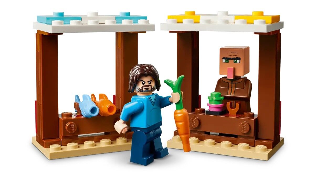 Конструктор LEGO Minecraft Напад на село з повітряною кулею Ґаст (21273)